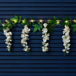 Solar Powered 180cm Artificial Leaf Garland With Wisteria Flowers - Warm White -B&M 379258 180cm solar powered artificial leaf garland with wisteria flowers 20 warm white micro leds 3